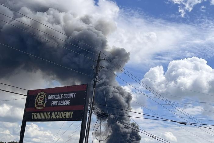 Some residents east of Atlanta were evacuated and others told to shelter in place after a fire at a chemical plant.