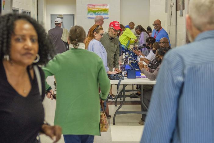 The line to get checked into the polls at the Theron Ussery Community Center in Macon on the first day of early voting in the 2024 general election.
