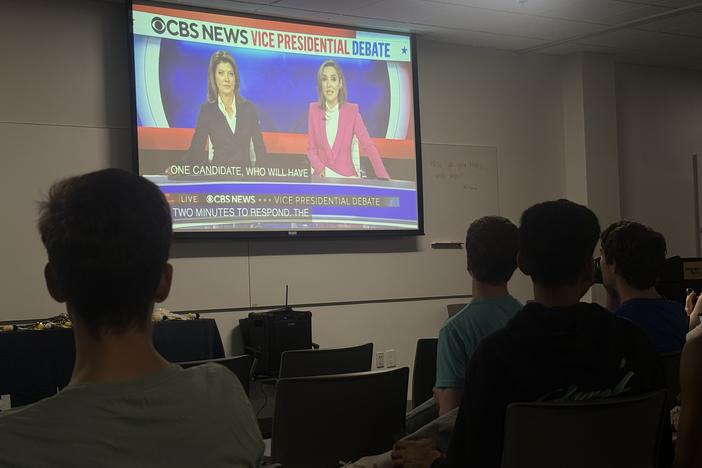 Students watch debate
