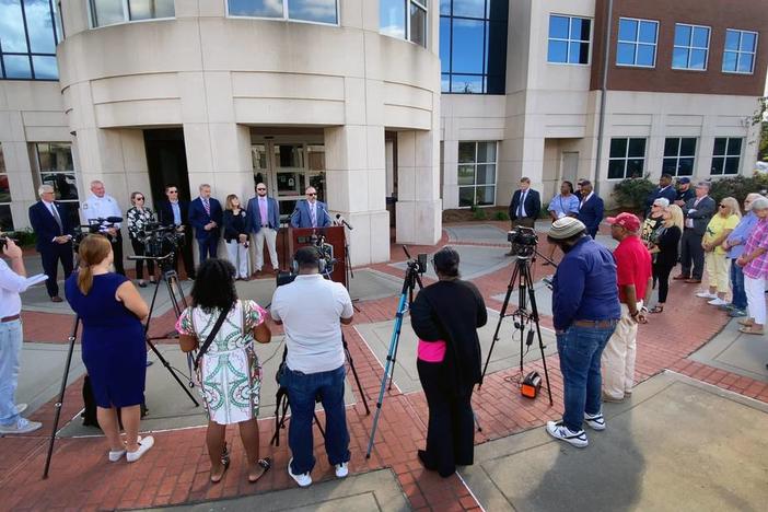 Deputy Chief Lance Deaton of the Columbus Police Department, at podium, speaks during a Tuesday afternoon press conference about Columbus Animal Care & Control. 10/01/2024 Mike Haskey mhaskey@ledger-enquirer.com  