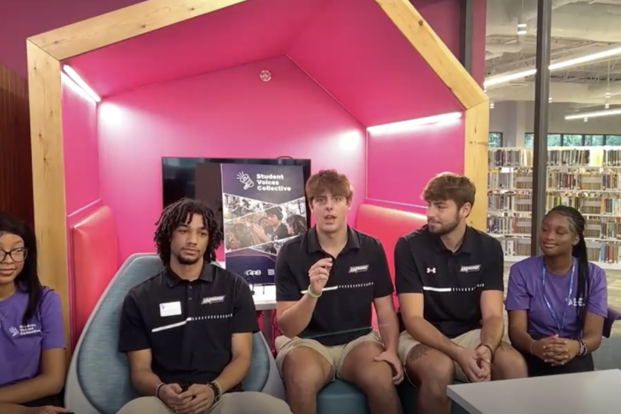 LaGrange High School students TyCianna Rome (left) and Chariya Johnson (right) interview LaGrange College men's basketball players (left to right) Tayshawn Pendleton, Ethan Richerzhagen and Colin Slatton in September 2024.