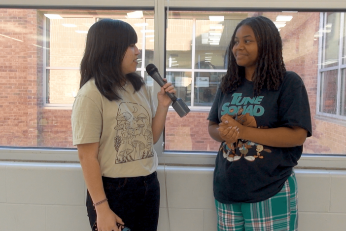 Dunwoody High School student Elizabeth Rodas-Miranda interviews students about what democracy means to them and what qualities they are looking for in a president. Screenshot