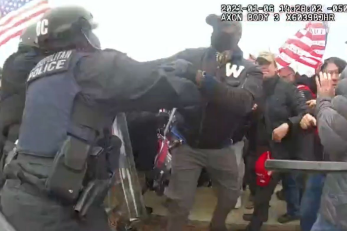 Leander Antwione Williams, identified by the FBI as the man with a “W” on his shirt, is seen on bodycam footage in an altercation with police officers during the Jan. 6, 2021, attack on the U.S. Capitol.