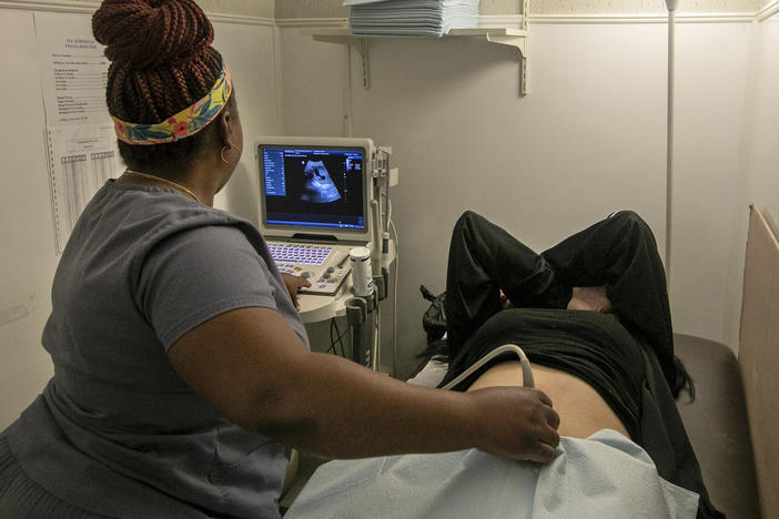 An operating room technician performs an ultrasound on a patient at Hope Medical Group for Women in Shreveport, La., on July 6, 2022. Abortion clinics in Louisiana have halted procedures after an appeals court ruled on Friday, July 26, 2022, that the state’s strict ban on abortion must be reinstated as an ongoing legal challenge plays out.