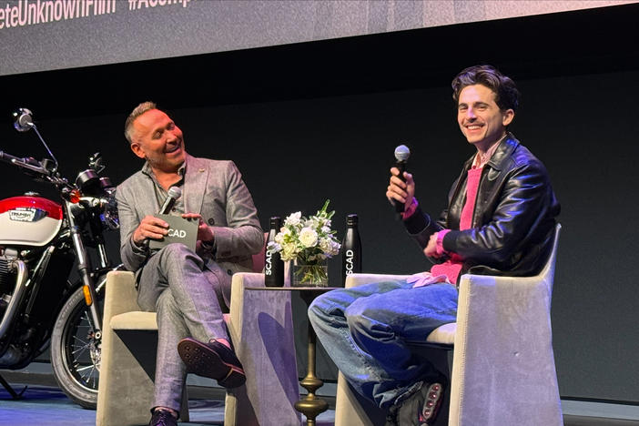 Actor Timothée Chalamet (right) answers questions after a screening of the Bob Dylan biopic, A Complete Unknown, hosted by Associate Dean of Film and Acting, Karl Rouse (left) at SCAD in Midtown Atlanta on Dec. 7, 2024.