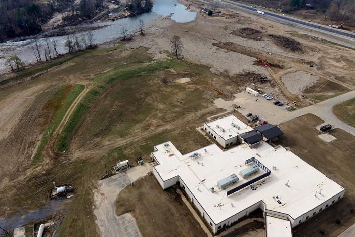 On Sept. 27, when Hurricane Helene hit the Southern Appalachians, rain from higher altitudes transformed the river into a deadly flash flood, ripping a path of destruction through Erwin. The flood claimed lives, leveled homes and businesses, and forced an emergency helicopter evacuation of Unicoi County Hospital, which opened next to the river in 2018. Maddy Alewine / KFF HEALTH NEWS