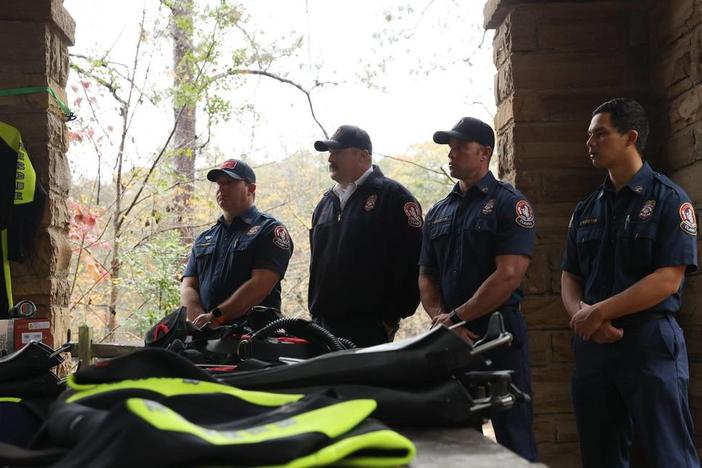 Members of the Macon-Bibb County Fire Department dive team stand near new scuba gear for the Bibb County Sheriff’s Office during a press conference on Tuesday, Dec. 10, 2024, at Amerson River Park in Macon, Georgia. The Bibb County Sheriff’s Office announced acquiring new scuba equipment that they will lend out to Macon-Bibb County Fire Department dive team to help in water emergencies. The money for the equipment was raised by the Macon-Bibb Law Enforcement Foundation. Katie Tucker/The Telegraph