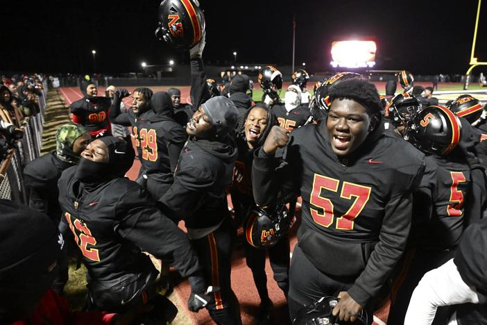 Northeast players celebrate their 46-14 win over Fitzgerald in Friday night’s GHSA state semifinal game. Jason Vorhees / The Melody