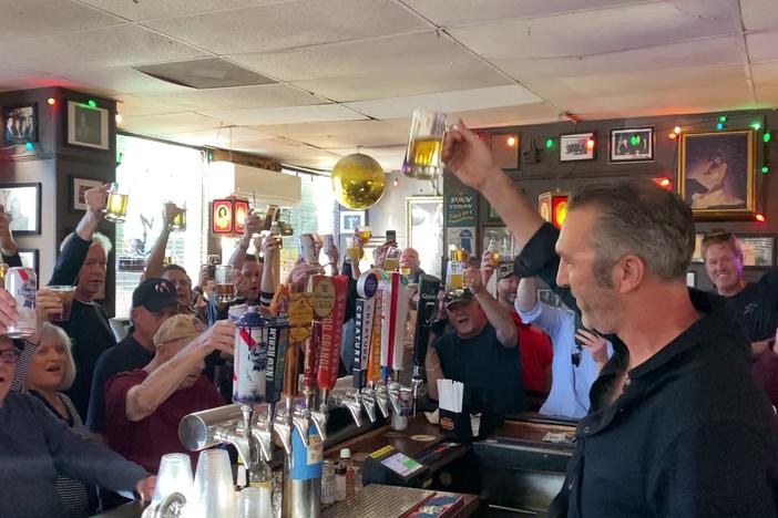 Patrons toast former President Jimmy Carter at The Original Pinkie Masters in Savannah on Monday, Dec. 30, 2024.