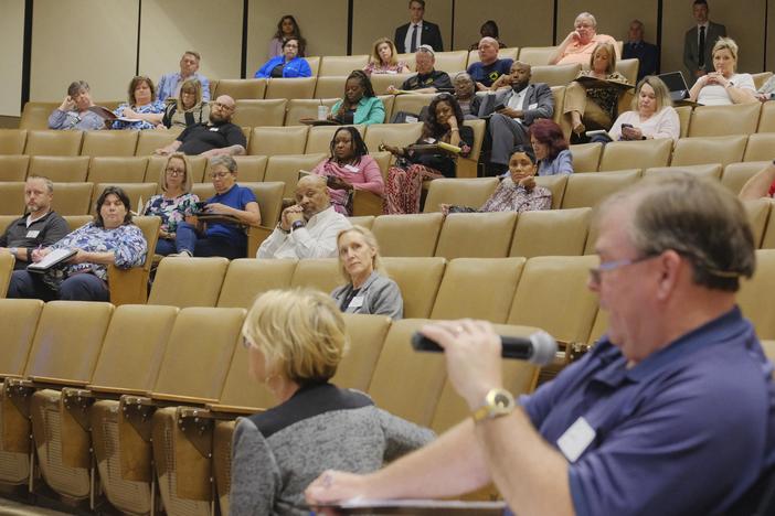 People affiliated with opioid recovery service providers listen in April to the question and answer portion of the Macon informational session around how Georgia's Opioid Crisis Abatement Trust will disburse millions of dollars of settlement funds.