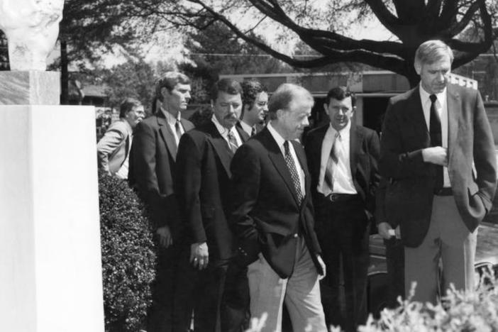 Former CDC Director Bill Foege, right, walks with President Jimmy Carter at the CDC headquarters in Atlanta in 1985. (CDC / Carter Center) 