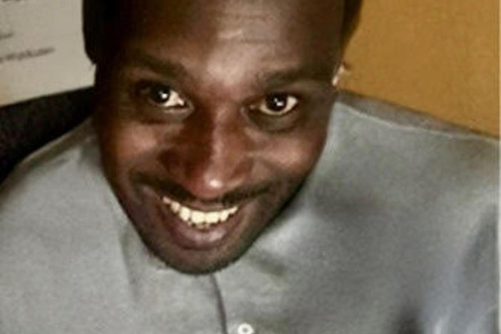 Cornelius Taylor is shown smiling in a close-up face photo.