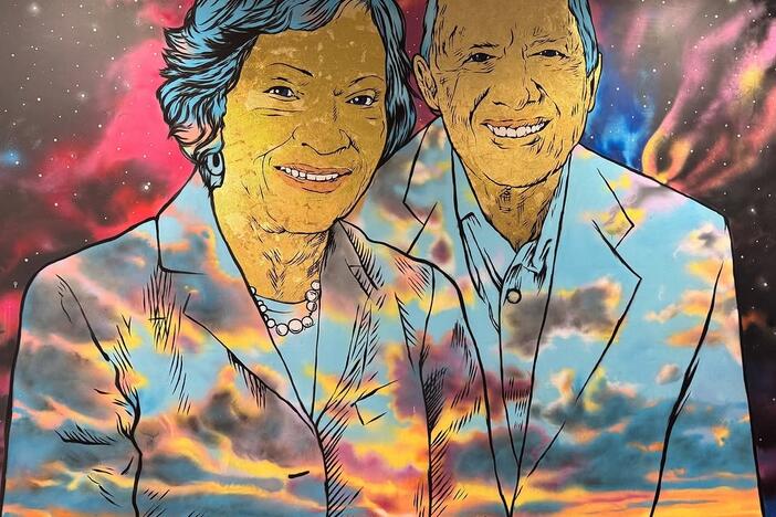 mural of President and Mrs. Carter greets visitors at Atlanta's airport