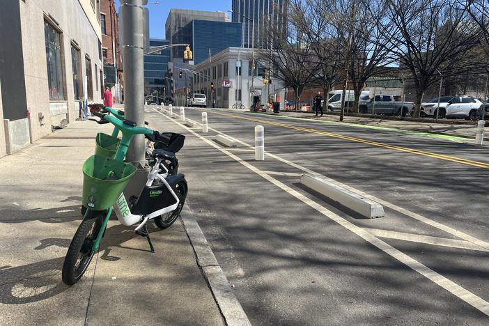 Upgrades to the bike lane on Forsyth street include new pavement and protections separating cyclists from car traffic. 