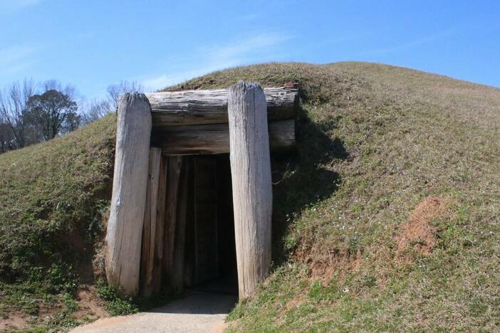 The entrance to the Earth Lodge sits along the paved path at Ocmulgee Mounds National Historical Park on Thursday, Feb. 27, 2025, in Macon, Georgia. After a failed effort in 2024, Georgia legislatures reintroduced a bipartisan bill to make the Ocmulgee Mounds Georgia’s first national park on Wednesday. Elijah Smith/The Telegraph