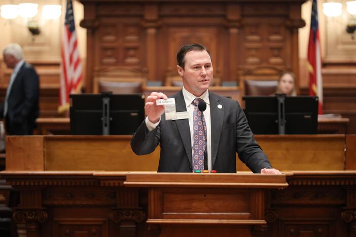Georgia Rep. James Burchett seen presenting Senate Bill 79 on Friday, March 28, 2025, which would increase the penalties for fentanyl trafficking in Georgia. He displayed the current margin for trafficking charges is four grams of fentanyl. Credit: Georgia House of Representatives