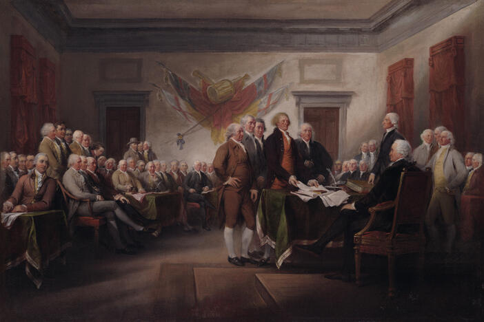 This image is a painting that depicts the signing of the Declaration of Independence.