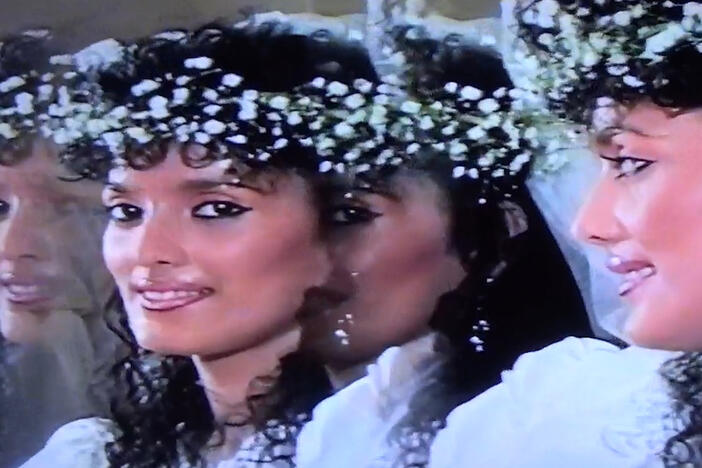 A woman in a wedding dress.
