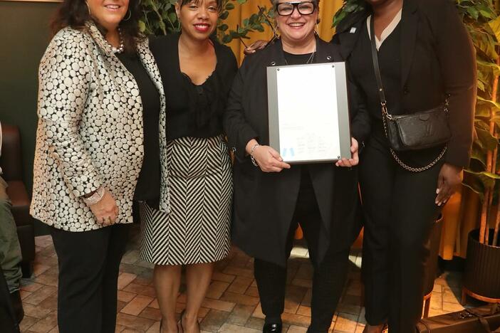 From left: Weny Cross, Philana Williams, Tammy Hurt (holding proclamation ) and Eshé Collins in Atlanta on April 2, 2025.