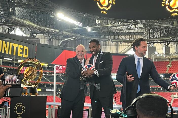 Andre Dickens stands with FIFA President Gianni Infantino at a Mercedes-Benz event on March 14, 2025