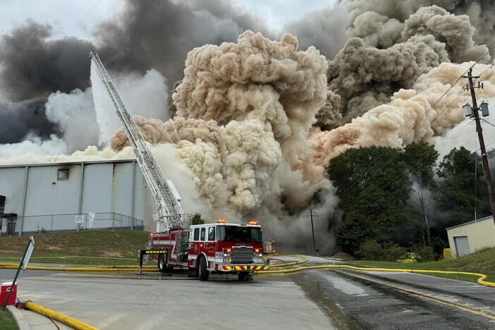 A chemical plume and heavy smoke rise from the BioLab facility in Conyers, Georgia, as firefighters respond to a chemical fire on September 29, 2024.