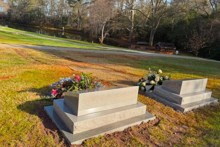 Images of President and Mrs. Carter’s final resting place: two headstones with flowers with pond in background. Jimmy Carter National Historical Park/Facebook