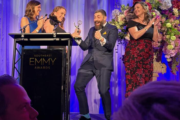 Emmy winners celebrating on stage.