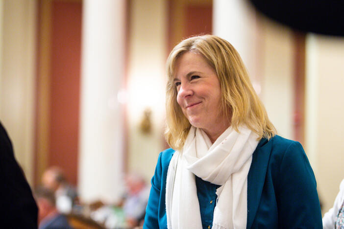  Speaker Emerita Melissa Hortman talks to colleagues during a special legislative session Monday, June 9, 2025 at the Minnesota State Capitol in St. Paul. (Photo by Nicole Neri/Minnesota Reformer)