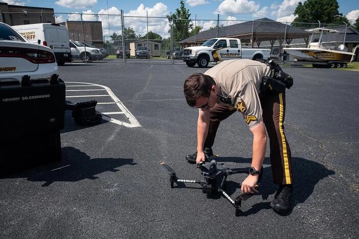 Bryan County Sheriff’s Office Deputy Campbell Grieninger performs pre-flight checks on a drone owned by the Sheriff’s department in Pembroke on June 19, 2025.