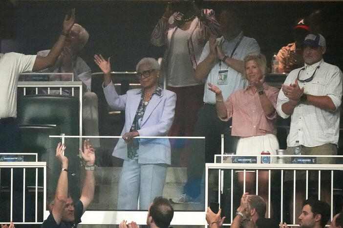 Billye Aaron, wife of baseball great Hank Aaron waves during at the MLB baseball All-Star game between the American League and National League, Tuesday, July 15, 2025, in Atlanta. (AP Photo/Mike Stewart)