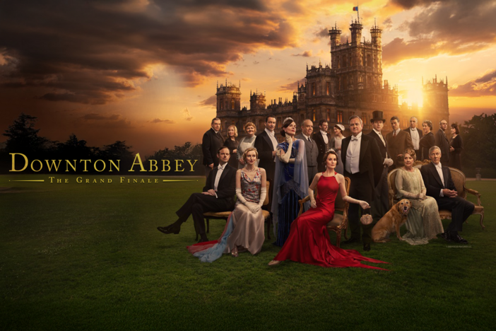 The cast of Downton Abbey poses in front of Highclere Castle