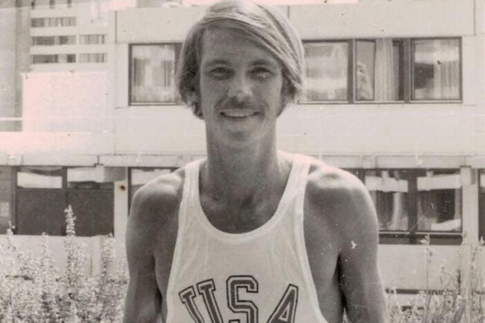 Jeff Galloway poses in team USA shirt.