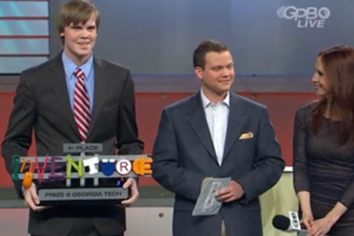 ChewBots inventor Christopher Taylor with the winning trophy