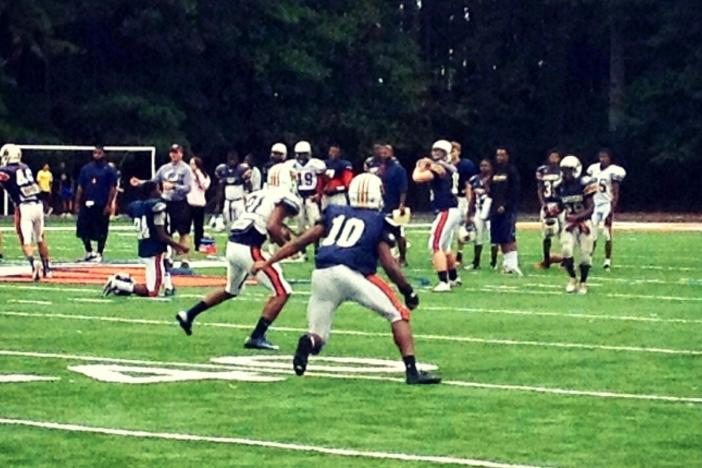 The North Cobb Warriors prepare for the Indians with "skelly" during Tuesday's practice to work on reading, adjusting and timing