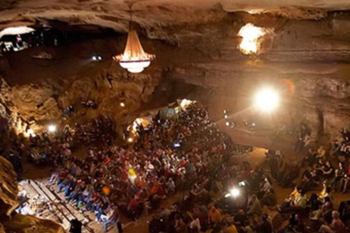 Crowd gathered for a concert inside a cave in Underground Bluegrass/ pbs.org/arts