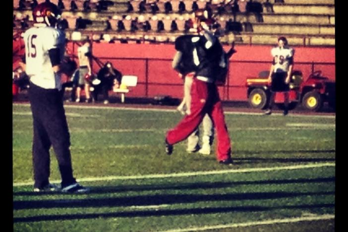 Lassiter quarterback Will Anderson throws to his receivers during Tuesday's practice