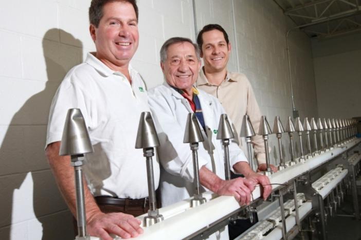 Geno Gasbarro (center) is the man behind much of the chicken consumed in the U.S. (photo courtesy of Dispatch.com)