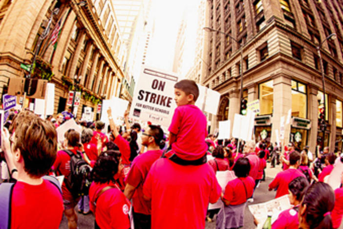 Chicago teachers rally during the walk out. Image courtesy flickr photostream kirstiecat.