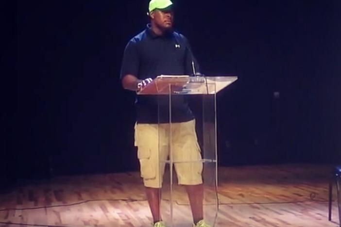 Former Frederick Douglass HS cornerback Ahmad Carroll serves as the keynote speaker at Atlanta Public Schools '14 media day.