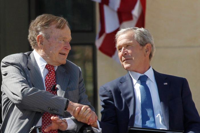 Presidents George H. W. Bush and George W. Bush weigh in on Trump’s first year in office.