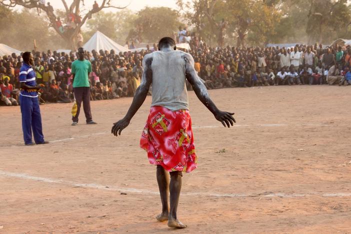 Sudanese civilians facing government bombing celebrate their heritage through music.
