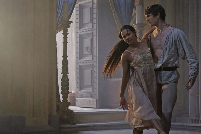 Romeo beckons Juliet down from her balcony and they share a romantic dance together.