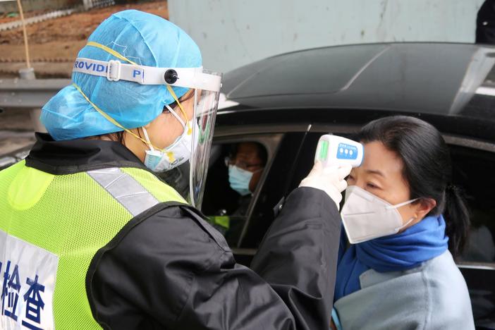 News Wrap: New novel coronavirus infections declining, WHO says