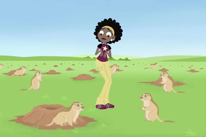 Tracker the Coyote leads Martin and Aviva to Koki's location in a prairie dog town.