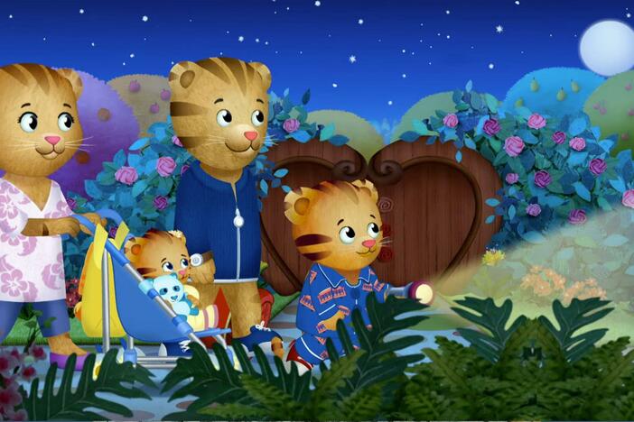 Daniel and his family sing goodnight and take a walk to see what's special at night.