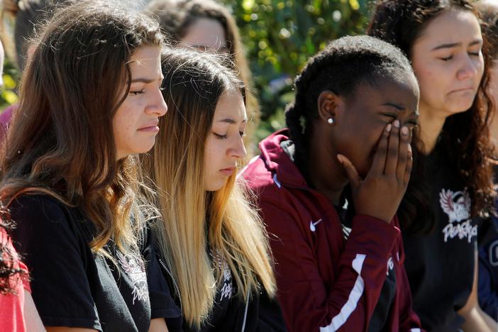 Florida school grieves deadly attack by teenage shooter.