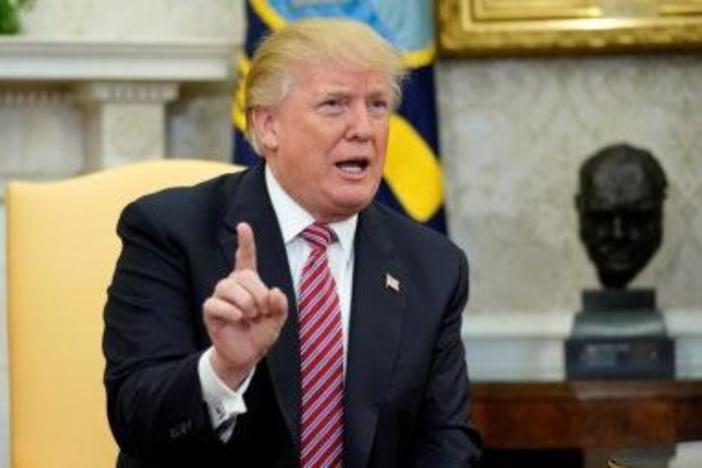 Trump charged that former President Obama should have done more about Russian meddling.
