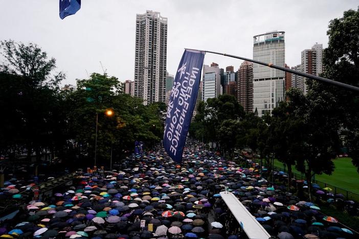 After recent chaos, Hong Kong protesters hold peaceful march