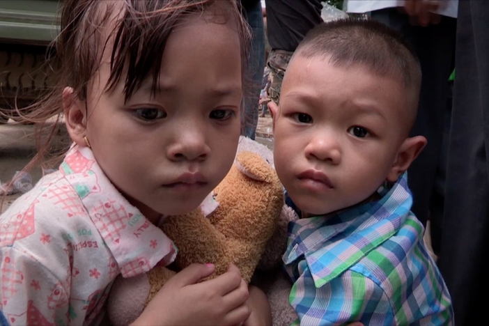 An excerpt from a news story describes the human trafficking of impoverished Cambodians.