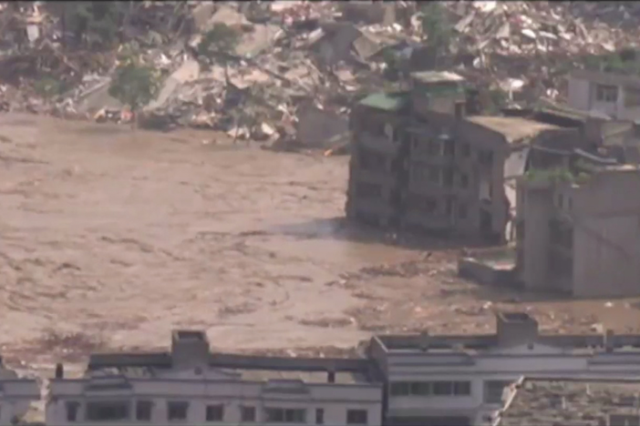 Engineers flood the destroyed city of Beichuan after the earthquake.